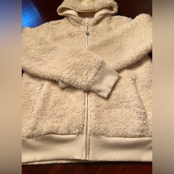 Athleta Girl warm off white zip up hoodie jacket. Wind-resistant.